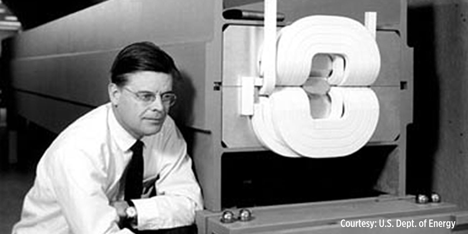 Robert Wilson with an early magnet design display. (Photo courtesy of U.S. Dept. of Energy)