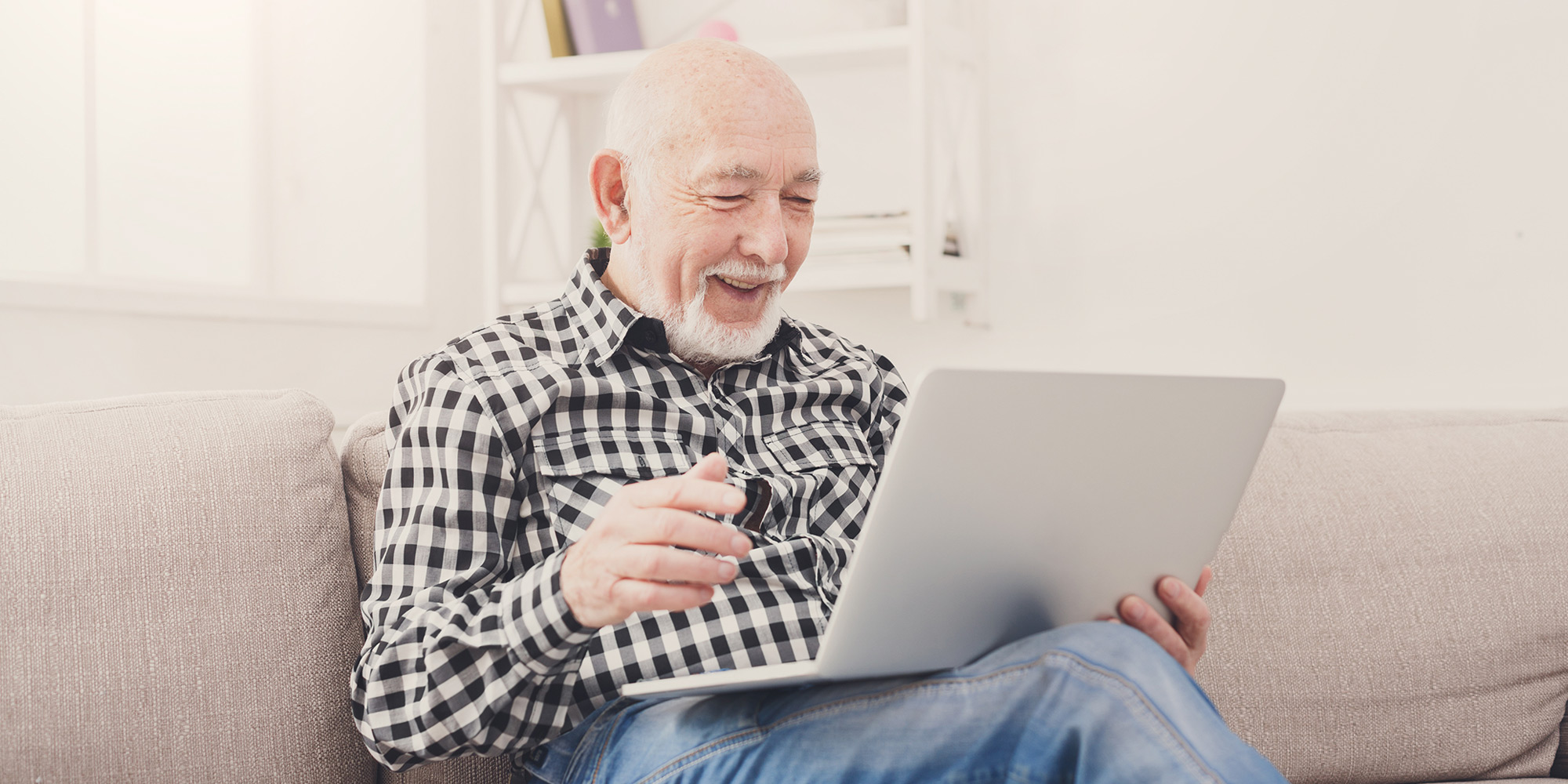Male cancer patient using telehealth