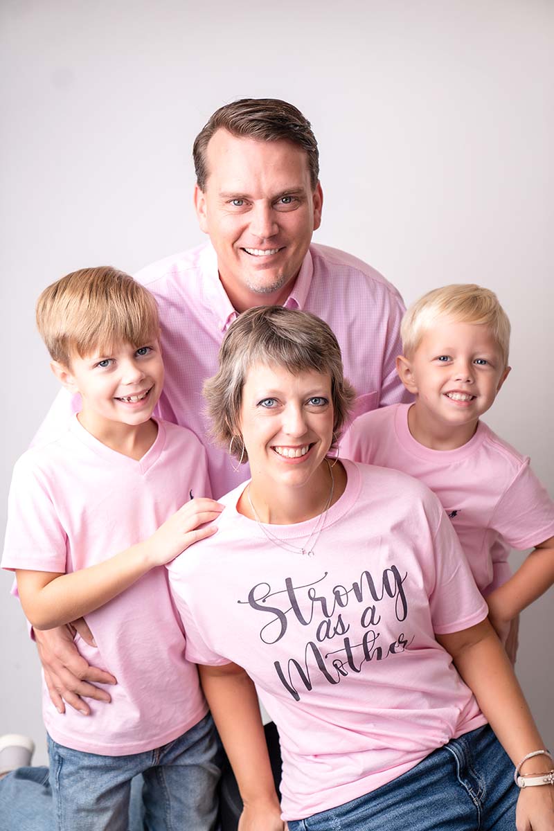 Leslie and her family with breast cancer t-shirts